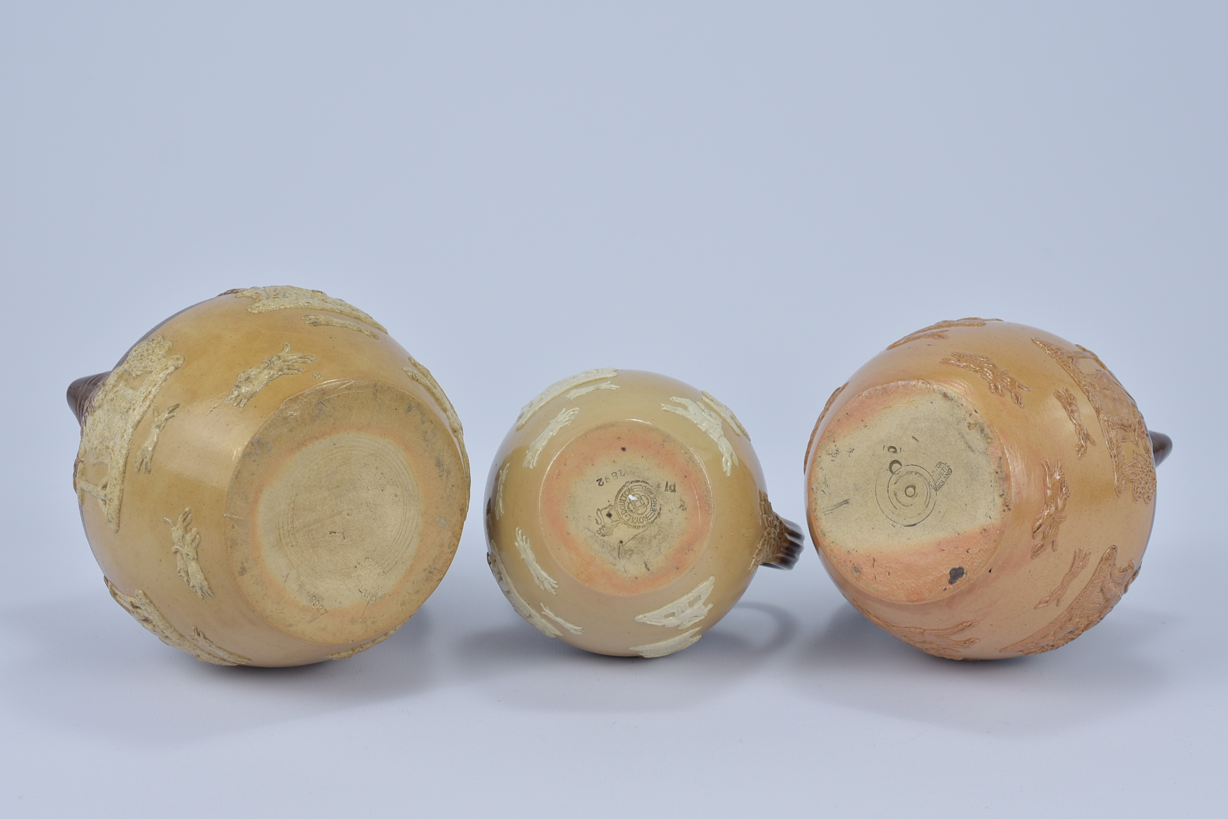 Three Royal Doulton Lamberth Stoneware Jugs. 11.4cm tall, 14cm tall, 14.5cm tall (3) - Image 3 of 3