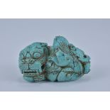 A Chinese carved turquoise stone Lion and Cub. 6cm x 4cm