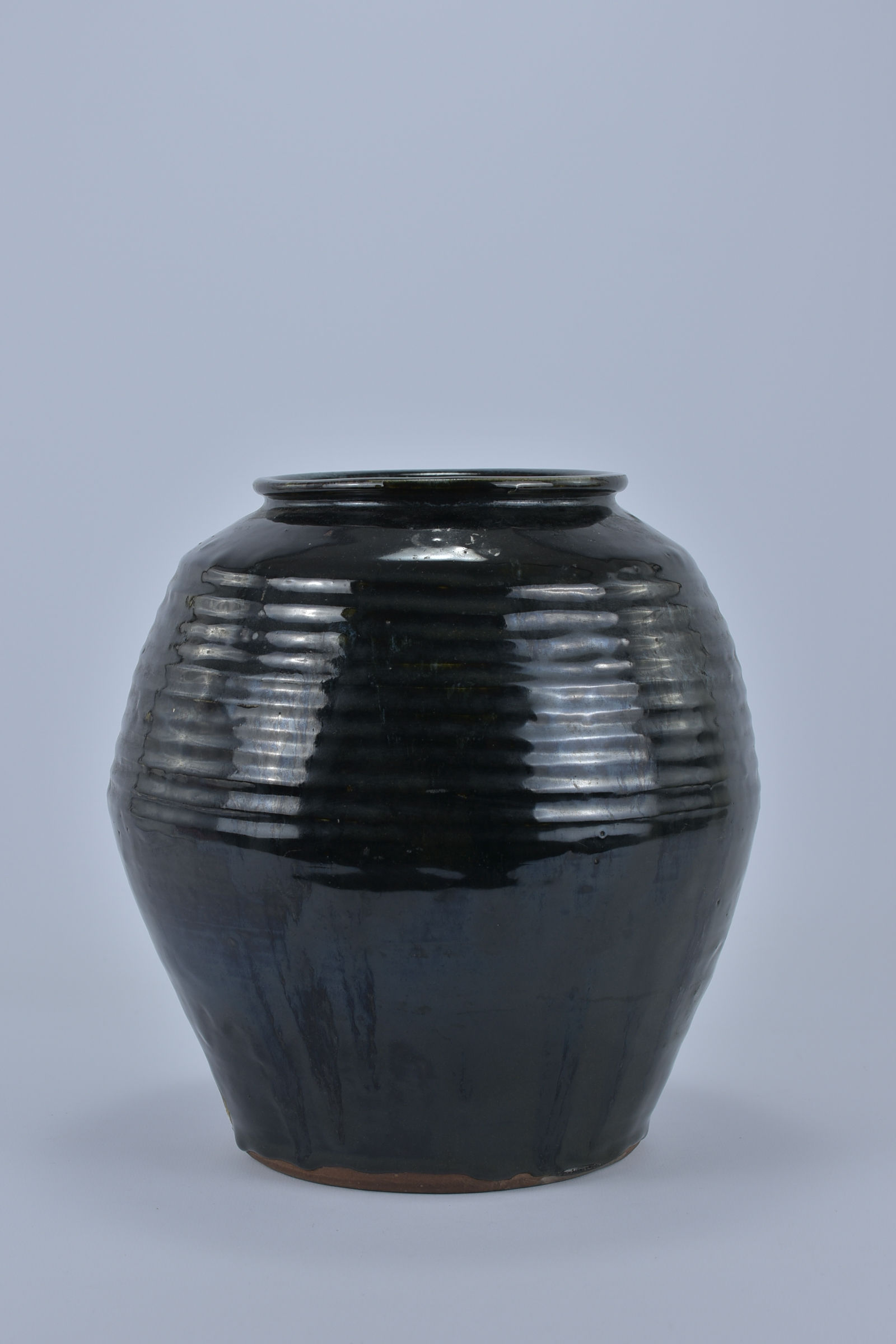 A Chinese Ming Dynasty style Black Glazed Jar. 26cm tall