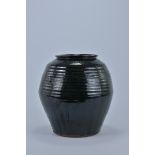 A Chinese Ming Dynasty style Black Glazed Jar. 26cm tall