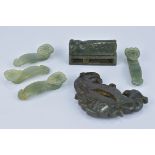 Six Chinese carved jade items. Including four Ruyi sceptres, one jade belt buckle and jade pendant.