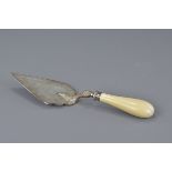 An Antique Victorian presentation trowel with ivory handle. 17cm length