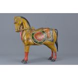 An antique Indian painted wooden horse.