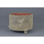 A Chinese Han dynasty grey pottery tripod basin. 30cm x 22.5cm