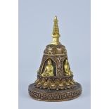 A Tibetan bronze pagoda statue with four seated Buddhas. 16cm height