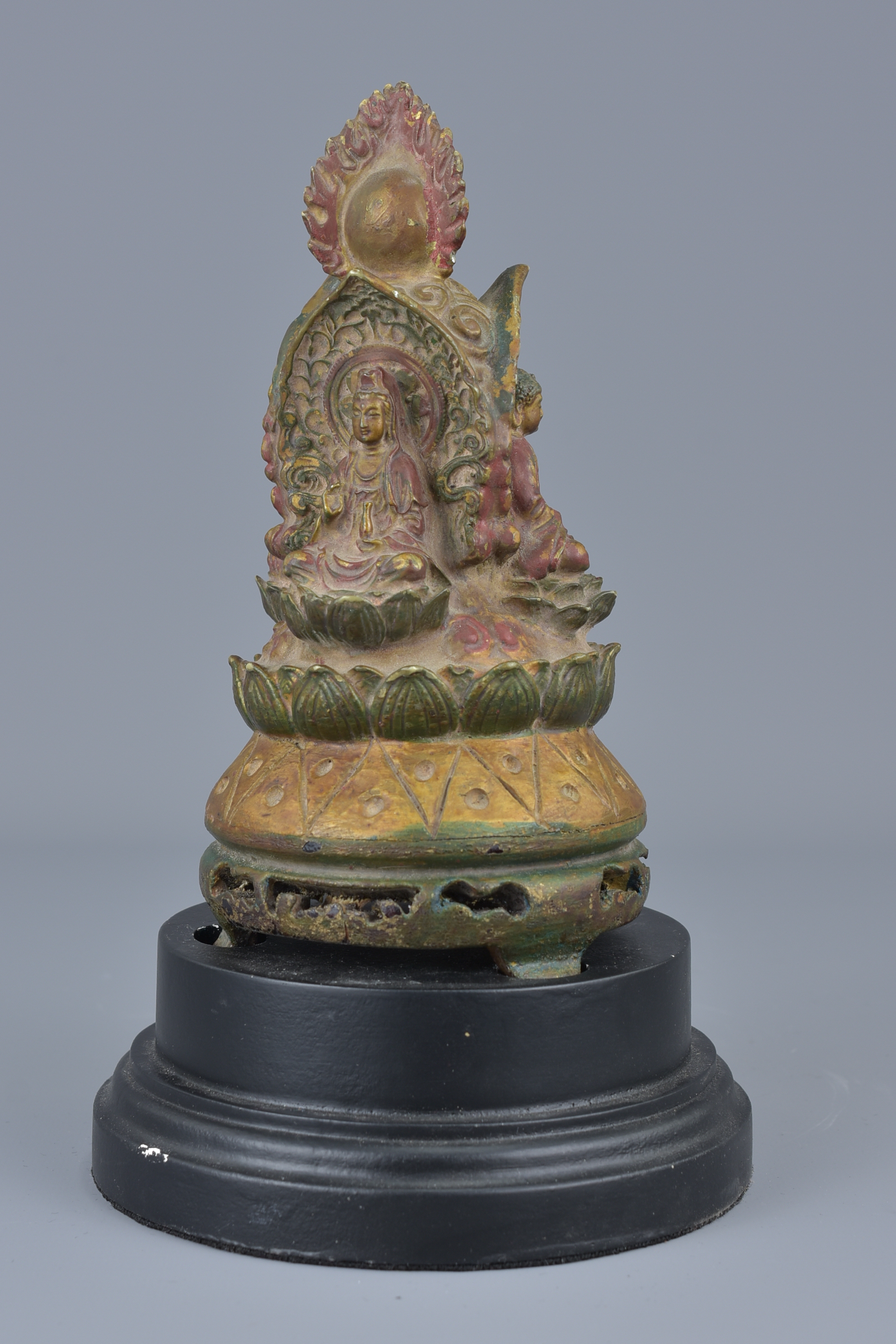 A Tibetan wooden pagoda carved with three Buddhas on display stand. 24cm height - Image 3 of 4