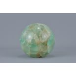 A Chinese green quartz stone ball hollowed. 6.5cm x 6.5cm