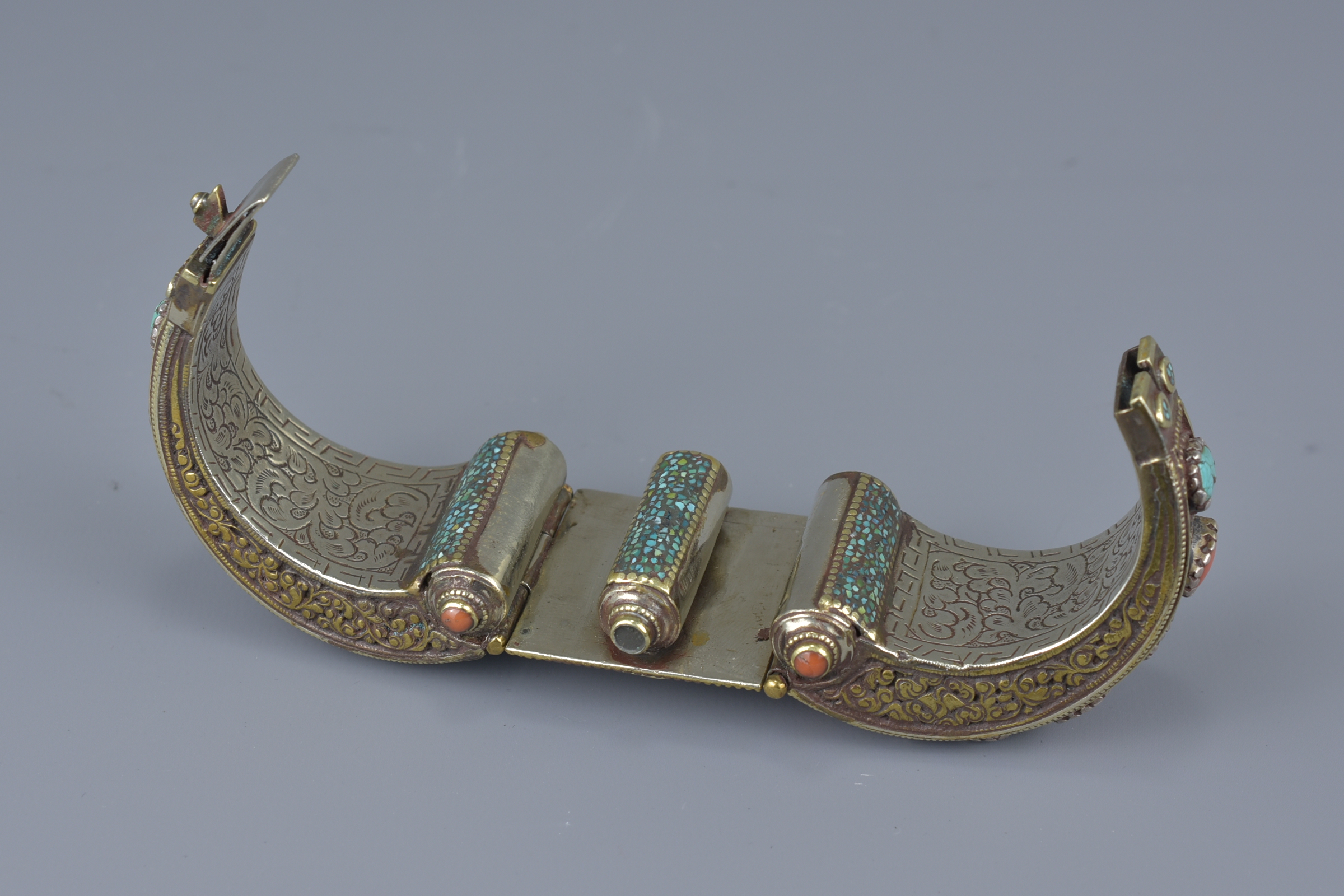 A Tibetan metal bracelet with various stone inserts. - Image 4 of 5