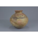 An Asian painted pottery jar, possible 12th/13th century. 22cm tall