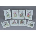 A set of eight 20th century Chinese porcelain plaques. Floral and birds design with calligraphy. 18.