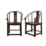 A pair of Chinese 17th/18th century Zitan wood horseshoe-back chairs