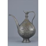 A large Islamic ewer incised decoration with birds