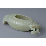 A Chinese carved celadon jade brush washer. 18cm