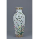 A Chinese 19th Century famille rose porcelain vase decorated with birds in trees with six character