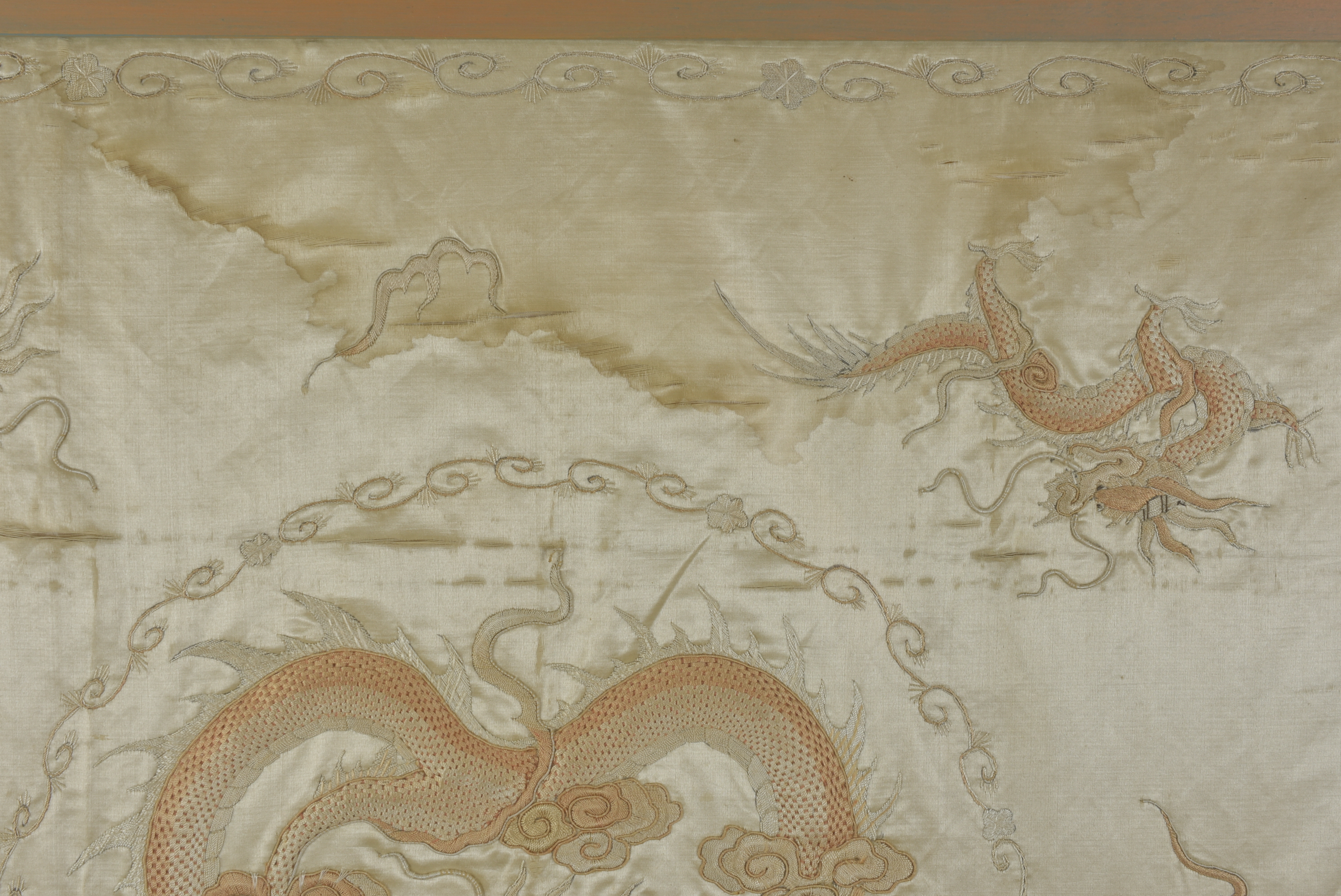 A large Chinese early 20th century framed embroidery of a Dragon. - Image 4 of 4