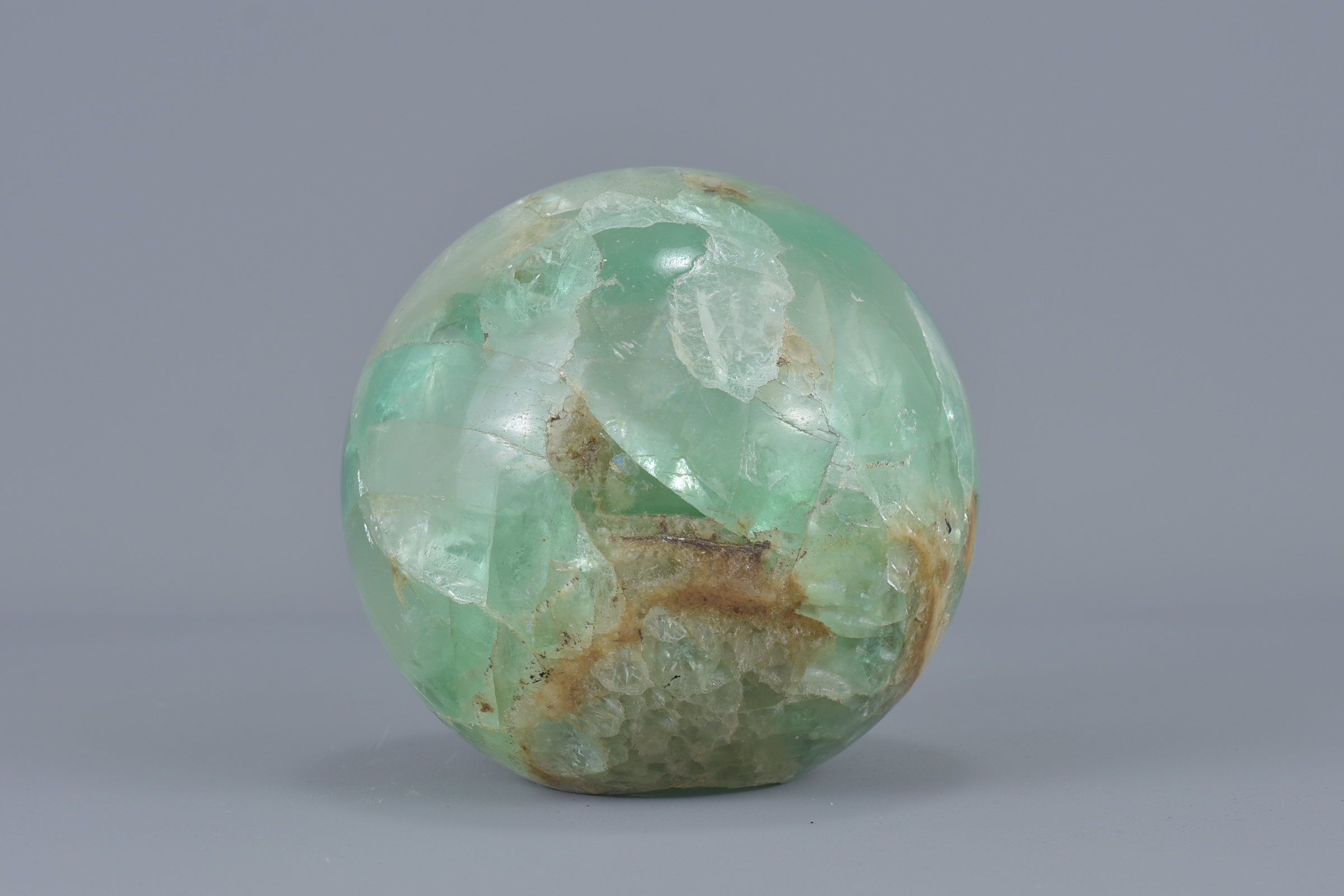 A Chinese green quartz stone ball hollowed. 6.5cm x 6.5cm - Image 2 of 4