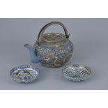 A Chinese 19th century cloisonné teapot together with two small cloisonné dishes.