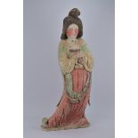 A very large Chinese Tang dynasty painted pottery fat lady. 99cm tall