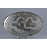 A Silver tray dated 1947 with Hong Kong style dragon decoration. 36cm x 23cm