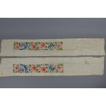 Two Chinese panels embroidered with flowers. 106cm