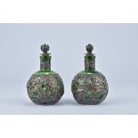 A Pair of 19/20th century Chinese export green Glass perfume scent  Bottles with Silver dragon and f
