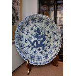 Enormous 118cm diameter Chinese 20th century blue and white porcelain dragon dish with later display