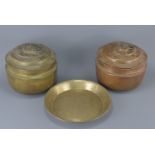 Two large brass metal pots with covers together with one large dish