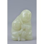 A Chinese 18th/19th century white jade carving of two children. 6cm tall