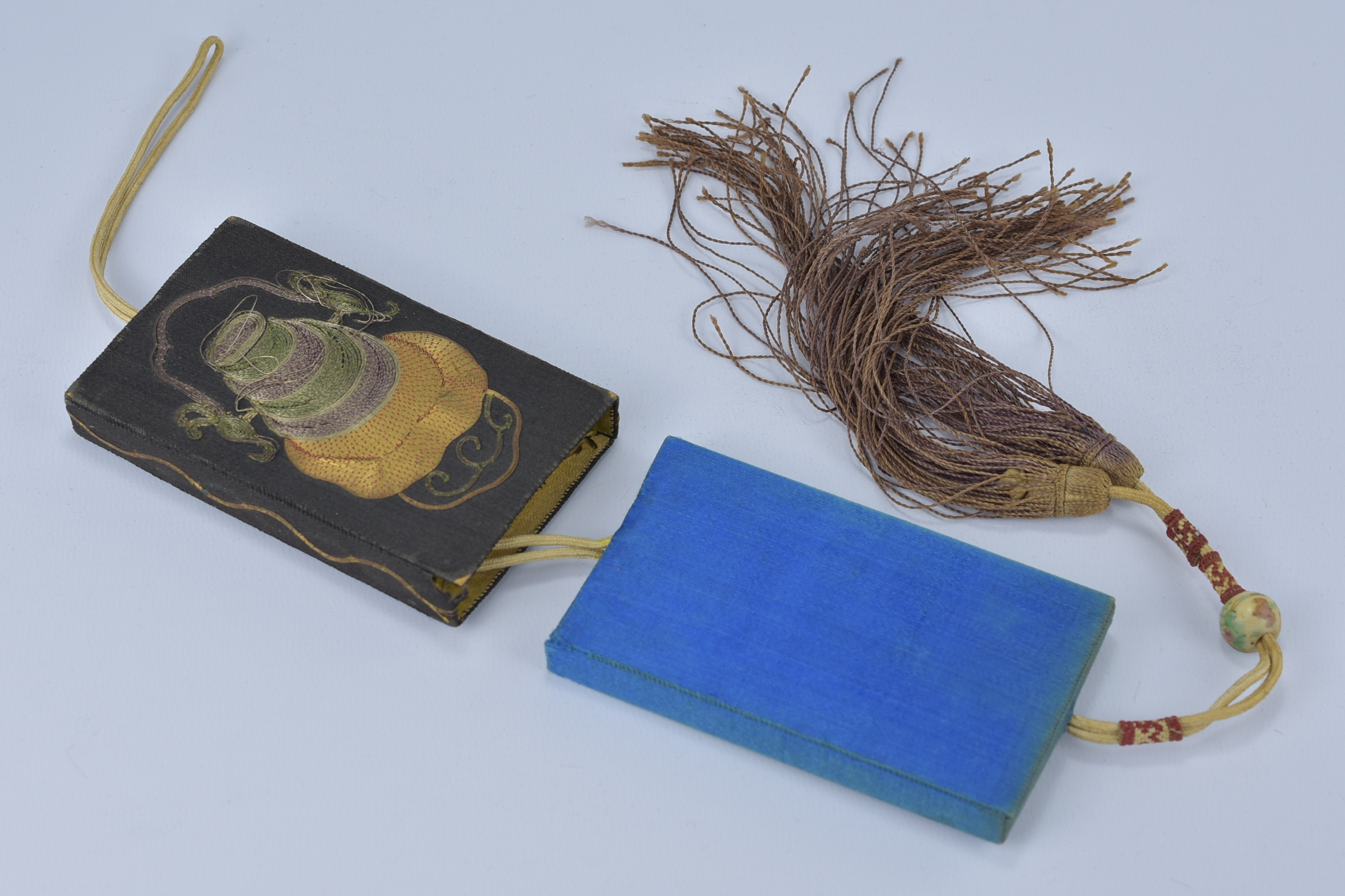 A 19/20th century Chinese embroidered card case with tassel and wire decoration. - Image 3 of 3