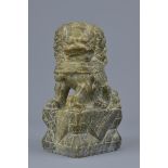 A Chinese carved stone Dog of Foo. 17cm