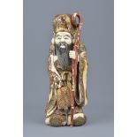 A Japanese 19th century carved and painted ivory figure of Shulu with makers mark to base. 29cm heig