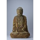 A Chinese Song / Ming dynasty wooden seated Buddha. 57cm tall