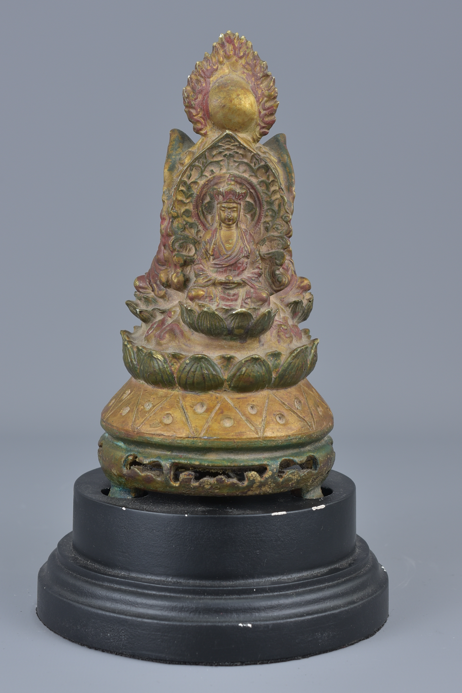 A Tibetan wooden pagoda carved with three Buddhas on display stand. 24cm height - Image 2 of 4
