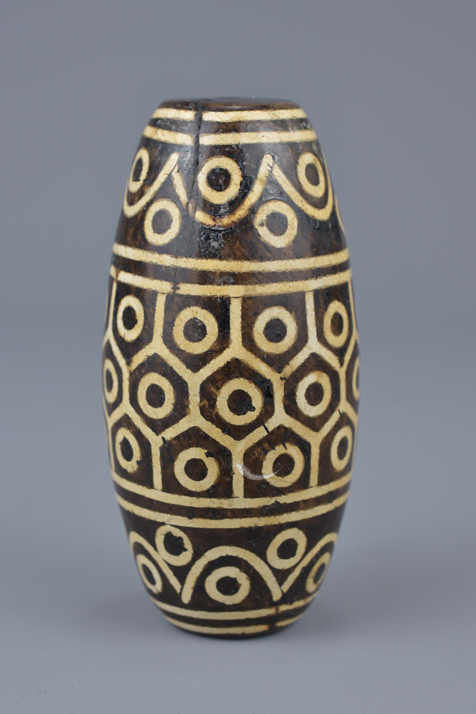 A large Tibetan painted pottery bead Tianzhu style. 9cm width - Image 2 of 6