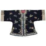 A Chinese 19/20th century embroidered jacket with flower a
