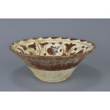 A Middle Eastern painted pottery bowl. 26 cm diameter.