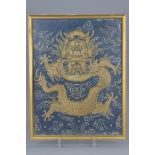 A Chinese 19th century framed embroidery of a dragon