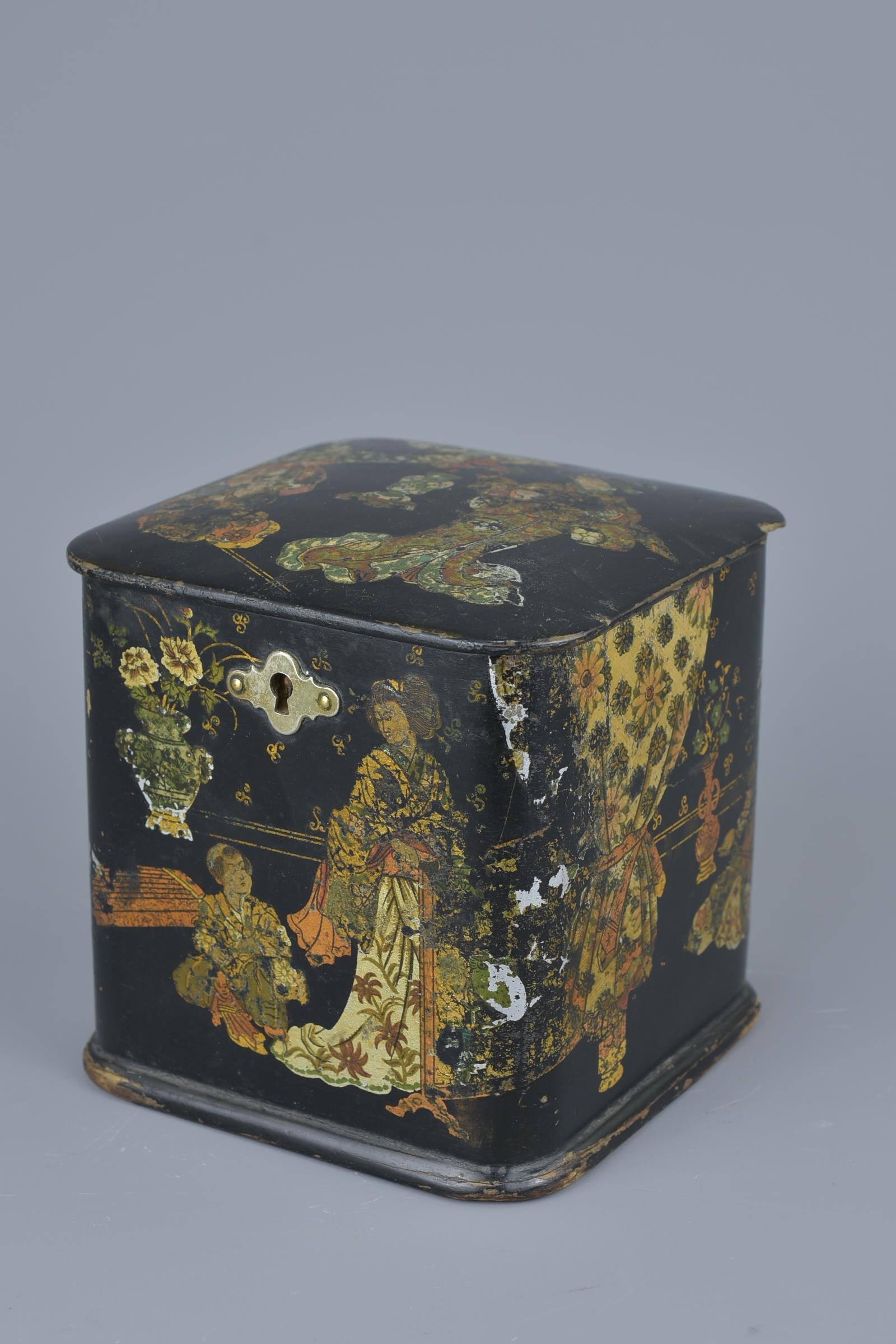 A Japanese lacquer Tea Caddy with Gold Gilding decorated with figures in garden. 11cm x 11cm