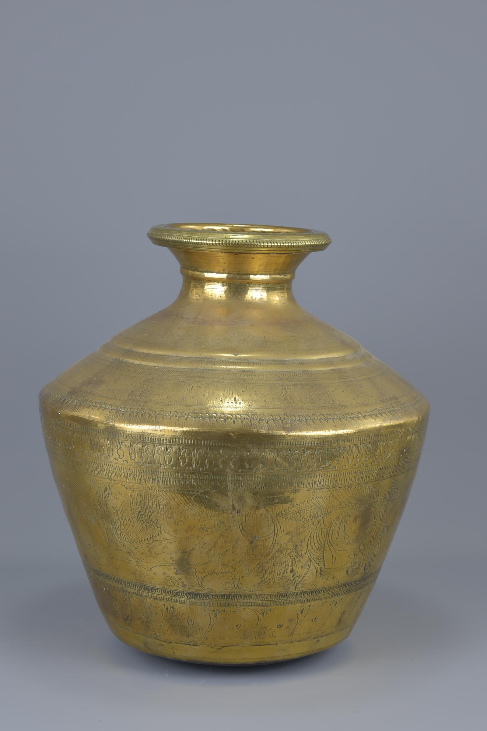 A large Indian polished bronze water vessel. - Image 2 of 5