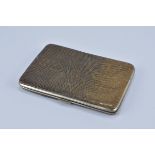 An English antique snake skin leather card case with metal casing.