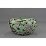 A Chinese 19th century turquoise green glazed porcelain dragon brush  washer with six character mark