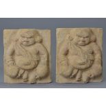 A pair of Chinese pottery tomb tiles carved as figures 17cm x 15cm x 16cm