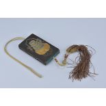 A 19/20th century Chinese embroidered card case with tassel and wire decoration.