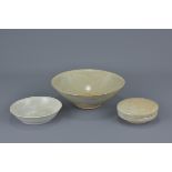 Two Chinese Song dynasty yinqing bowls together with a box and cover 16.5cm, 11cm and 8.5cm diameter