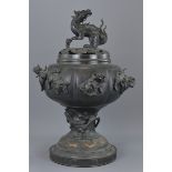 A Japanese bronze incense burner. 57cm tall