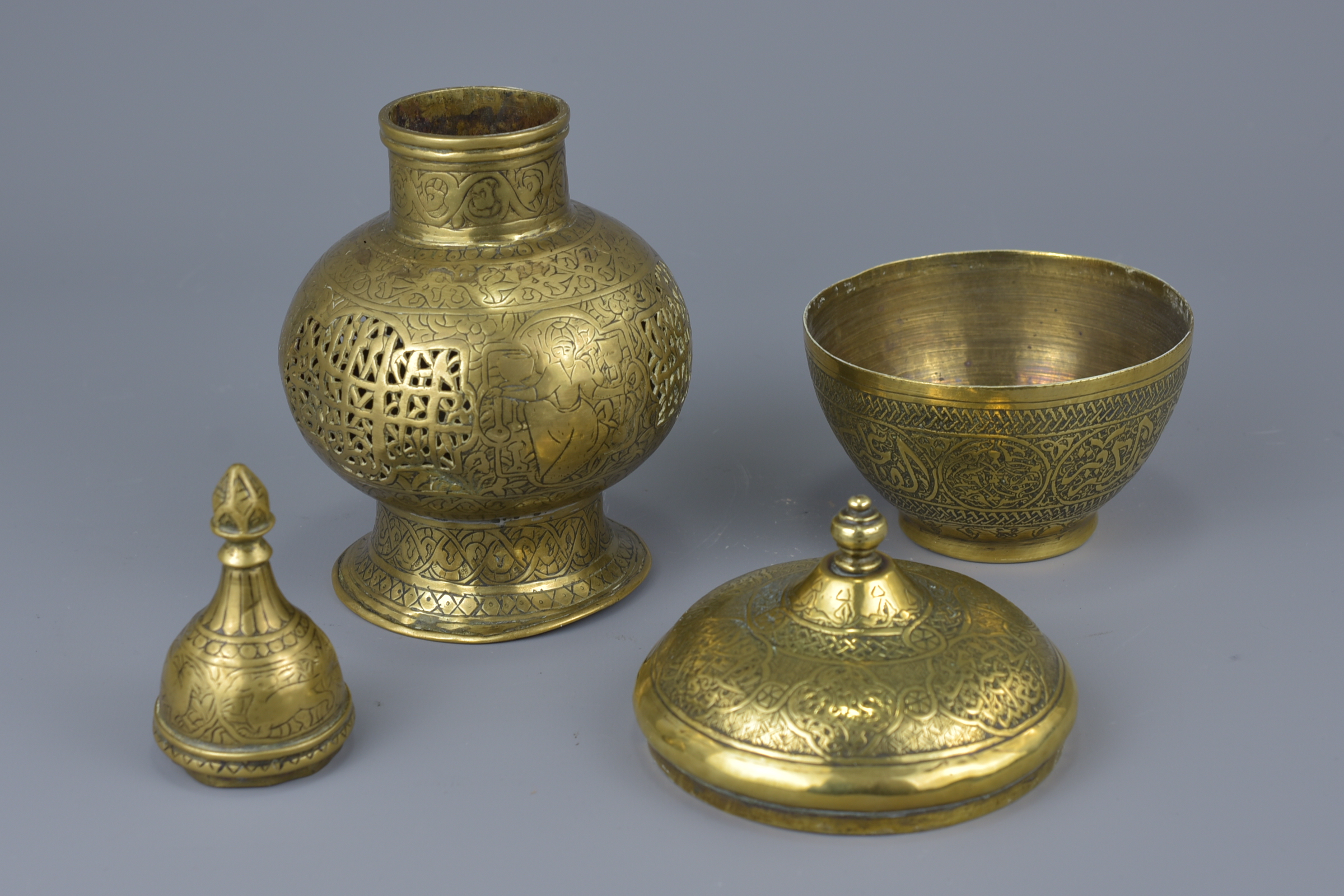 Two  Islamic brass items with covers with pierced decoration and bowl with inscription. 18cm height - Image 3 of 3