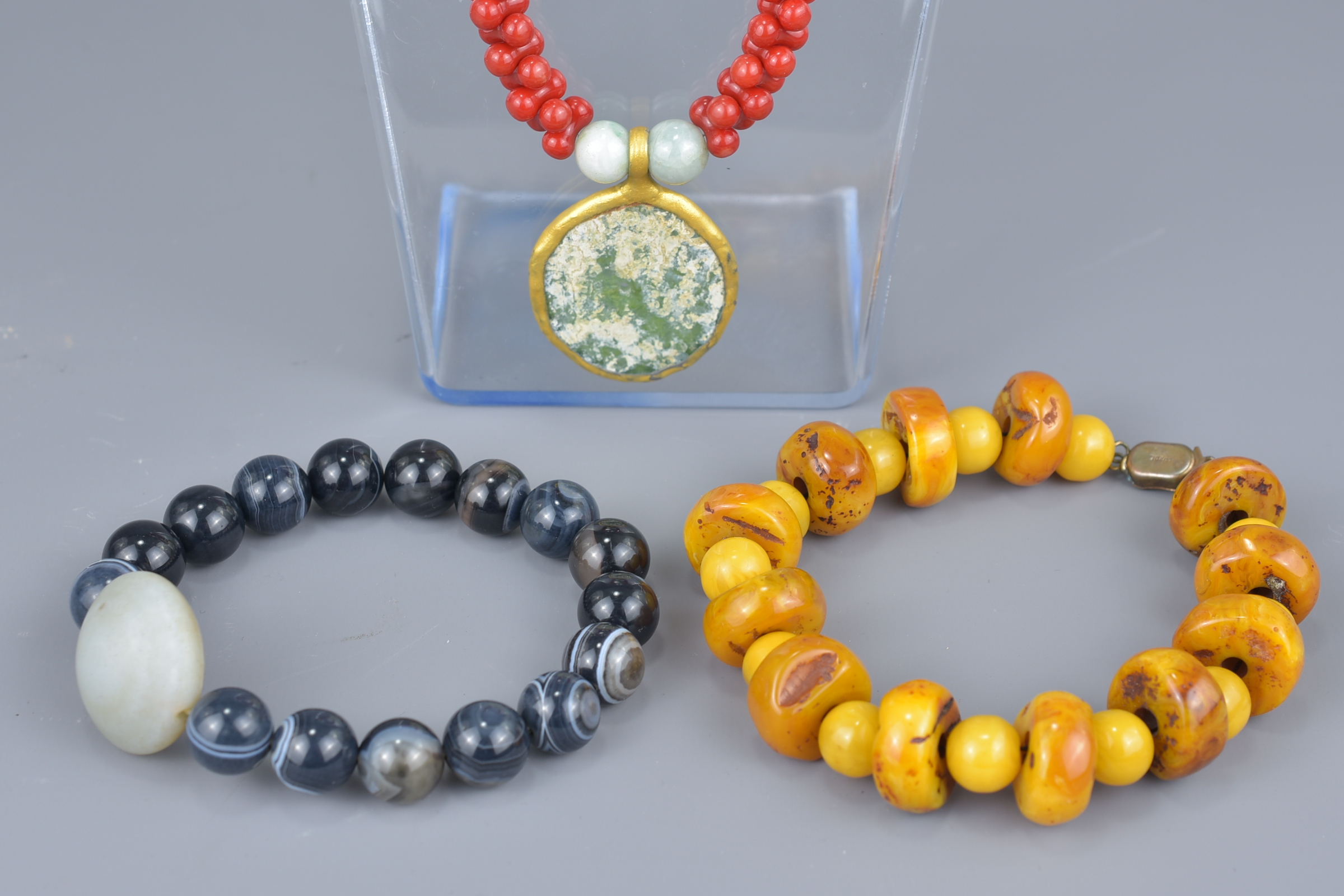 One beaded necklace with glass pendant and two beaded bracelets. - Image 2 of 2