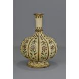 A Middle Eastern painted alabaster bottle vase with painted floral pattern design.