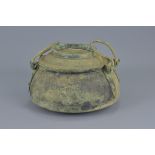 A Chinese Han dynasty bronze cooking pot with cover 16cm height