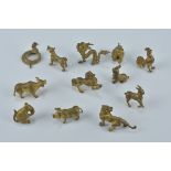 A set of twelve miniature yellow metal Chinese Zodiac figures. Approx. 1-1.5cm